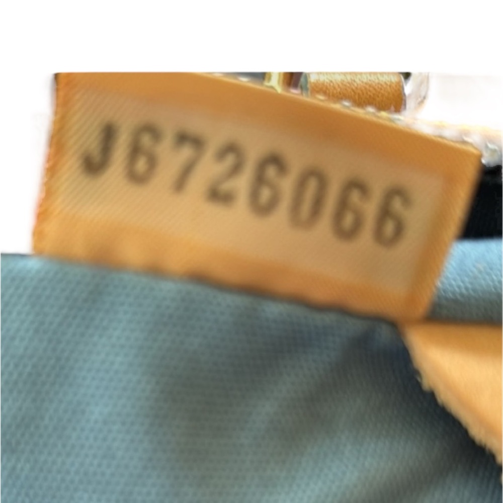 Dooney & Bourke Vintage Candy Rainbow
Barrel Bag - Picture 12 of 12